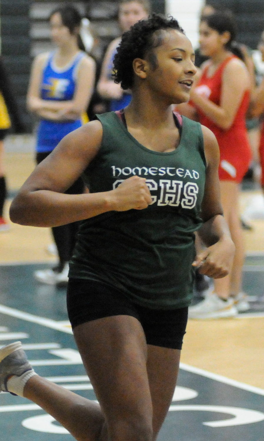 Ayana Banks, a sophomore, takes to the track in the 55-meter and 300-meter races. She also competes in the long jump and triple jump.